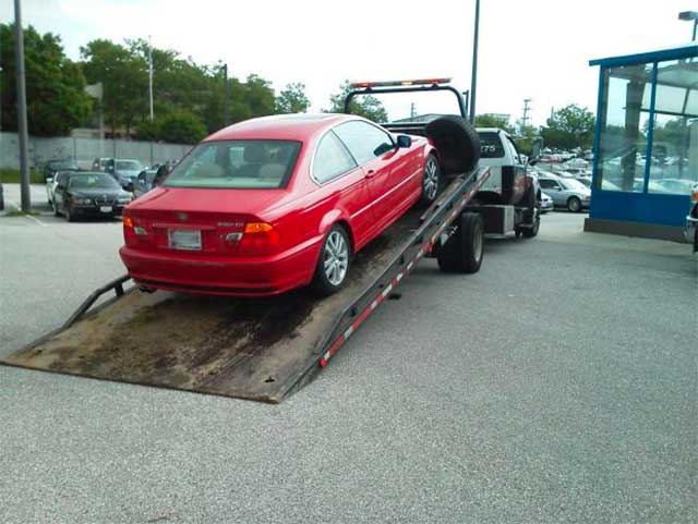 Junk-Car-Pick-Up-Towing-Abandoned-Vehicle-BMW-Red