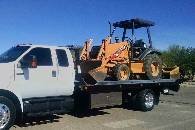 Equipment Towing Service Backhoe on Flatbed Tow Truck Upper Marlboro Maryland